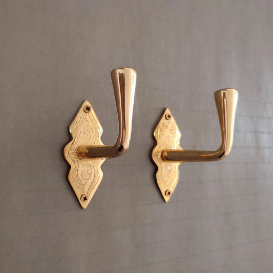 Vintage solid brass wall coat hook with engraved detailing