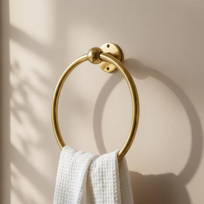 Close-up of a handcrafted solid brass towel ring