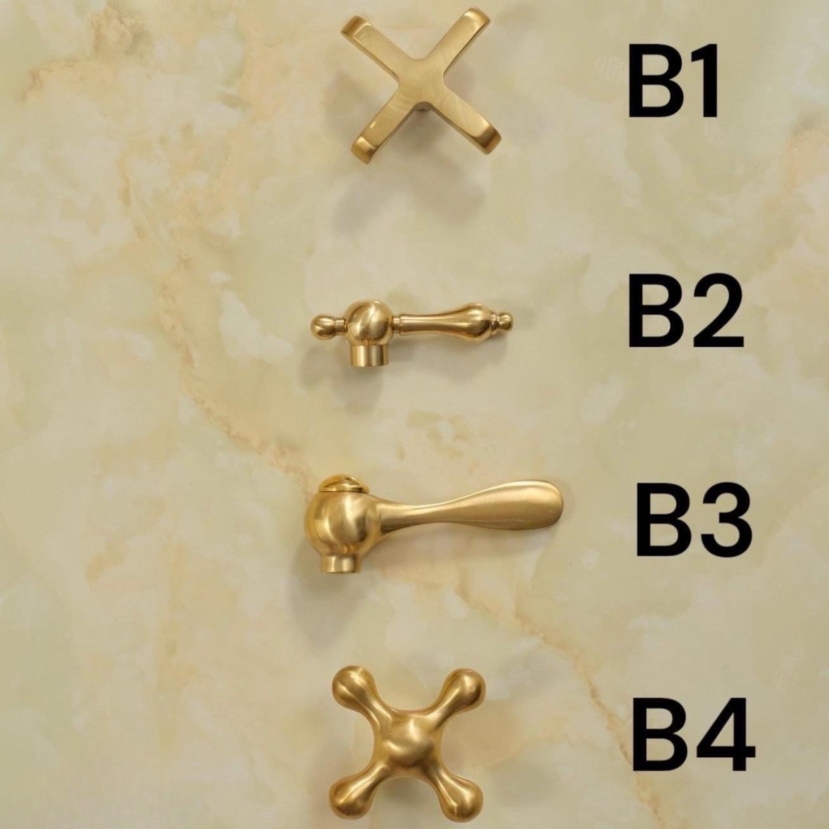 Close-up of dual handles on a solid brass widespread faucet