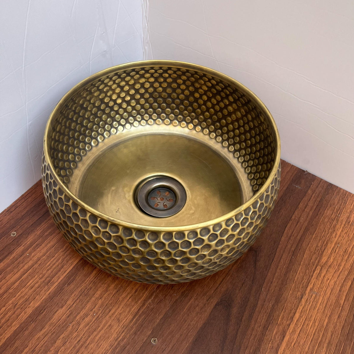 Close-up of the hammered texture on a solid brass sink