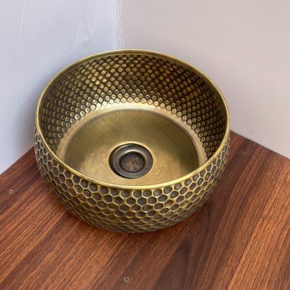 Close-up of the hammered texture on a solid brass sink