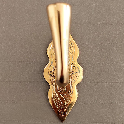Decorative brass wall hook for entryways