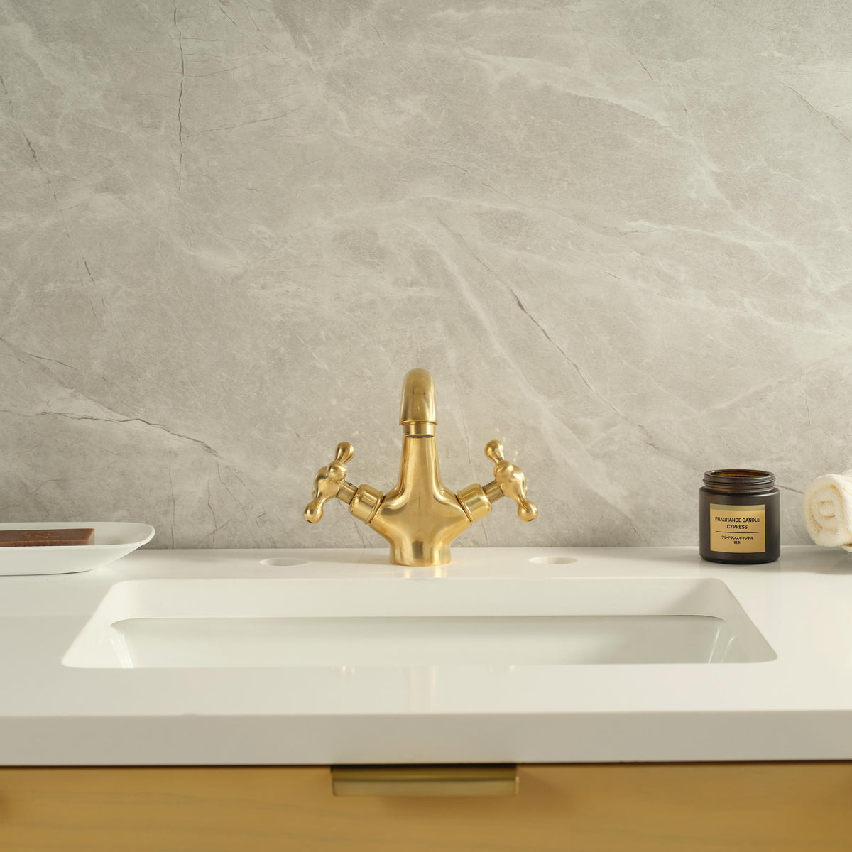 Detailed view of the solid unlacquered brass faucet spout with handcrafted finish