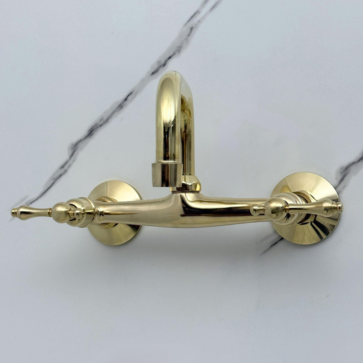 Handcrafted solid brass wall mounted faucet for bathroom vanity