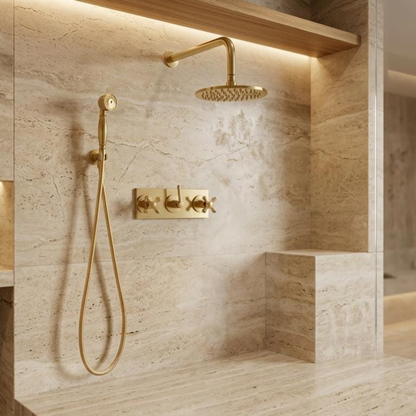 Handcrafted unlacquered brass shower system with a handheld shower