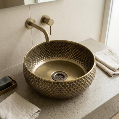 Handmade hammered round brass vessel sink in unlacquered brass
