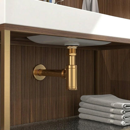 Living brass bottle trap for an exposed bathroom vanity