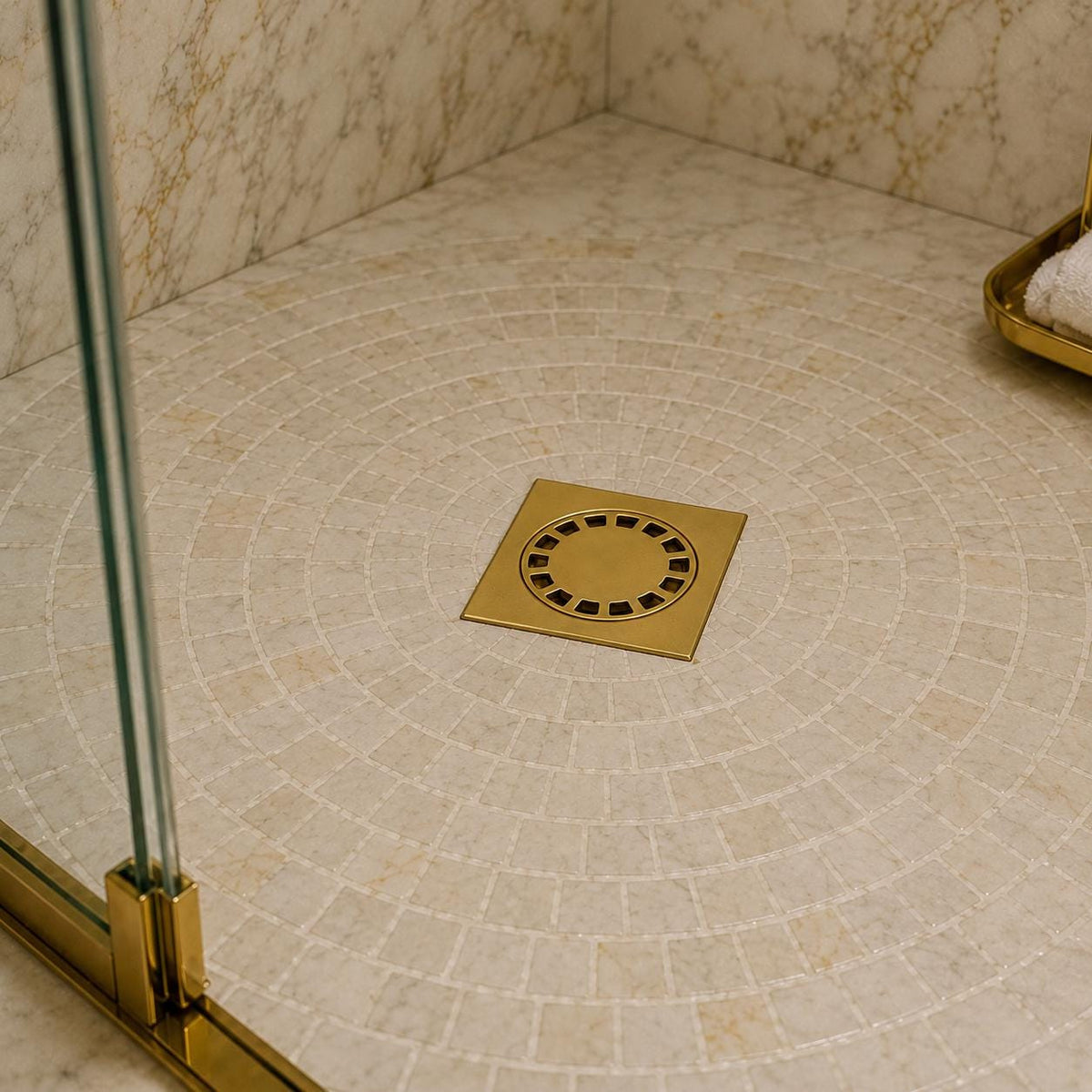 Living brass floor drain cover for a walk-in shower