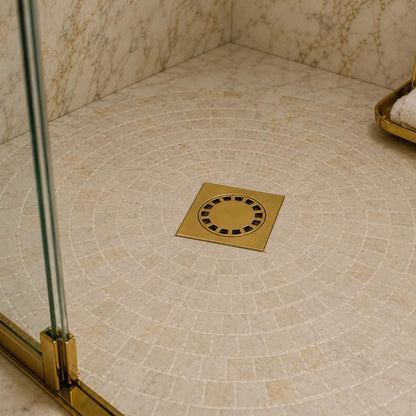 Living brass floor drain cover for a walk-in shower