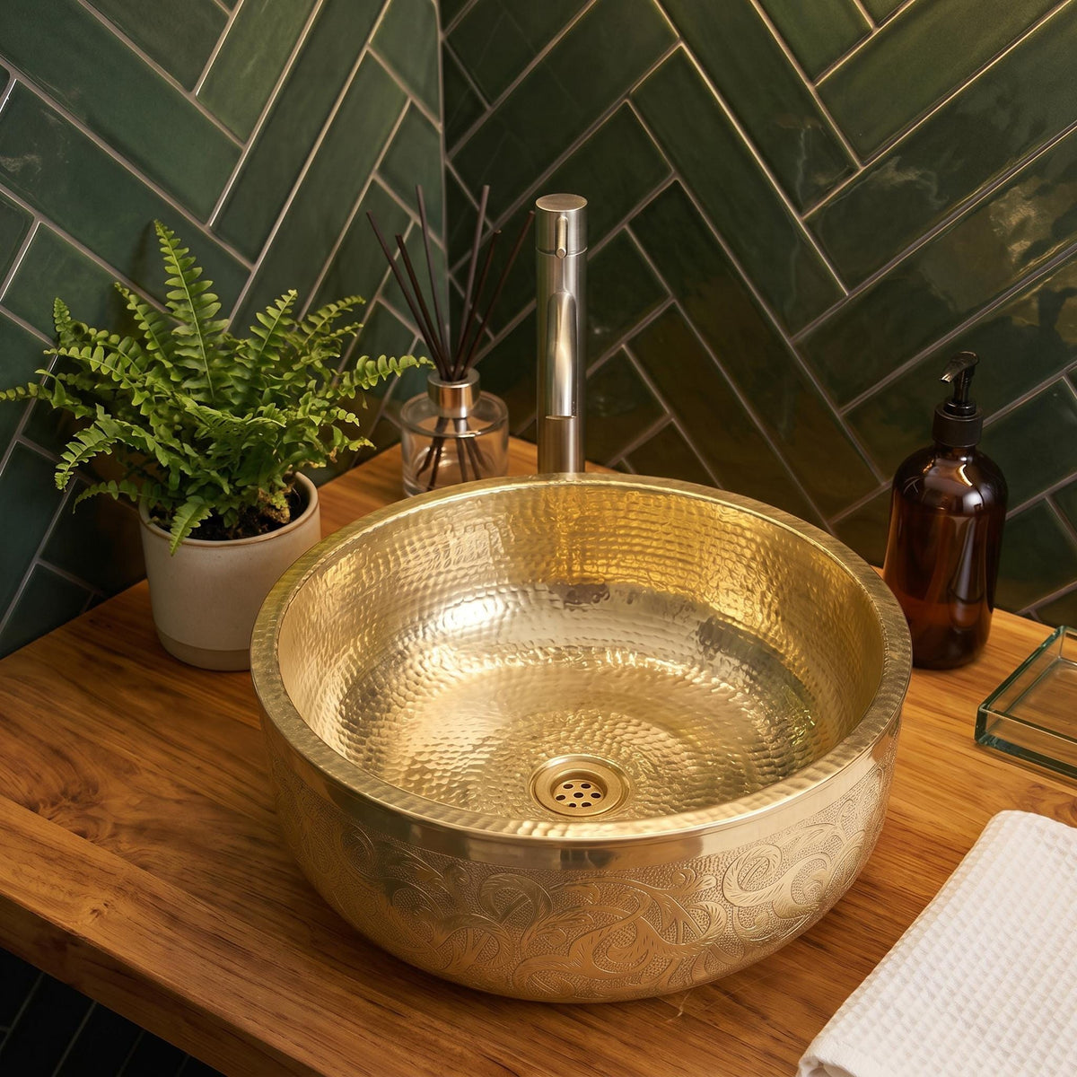 Luxury engraved brass vessel sink with a polished finish