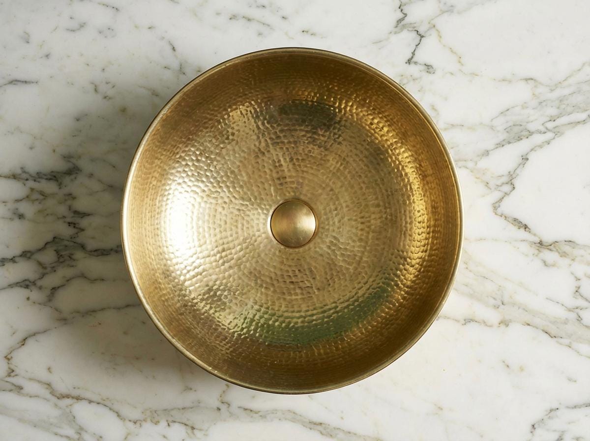 Luxury handcrafted brass wash basin for a rustic bathroom vanity