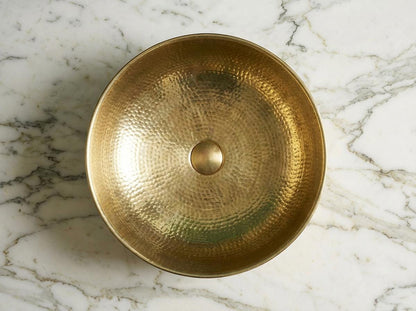 Luxury handcrafted brass wash basin for a rustic bathroom vanity