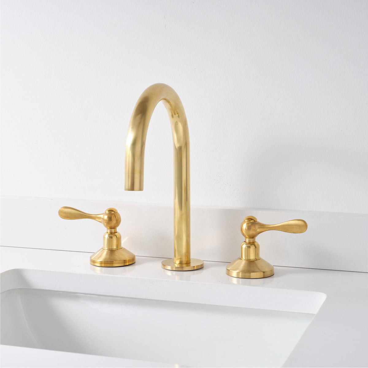 Luxury unlacquered brass bathroom faucet for a premium vanity