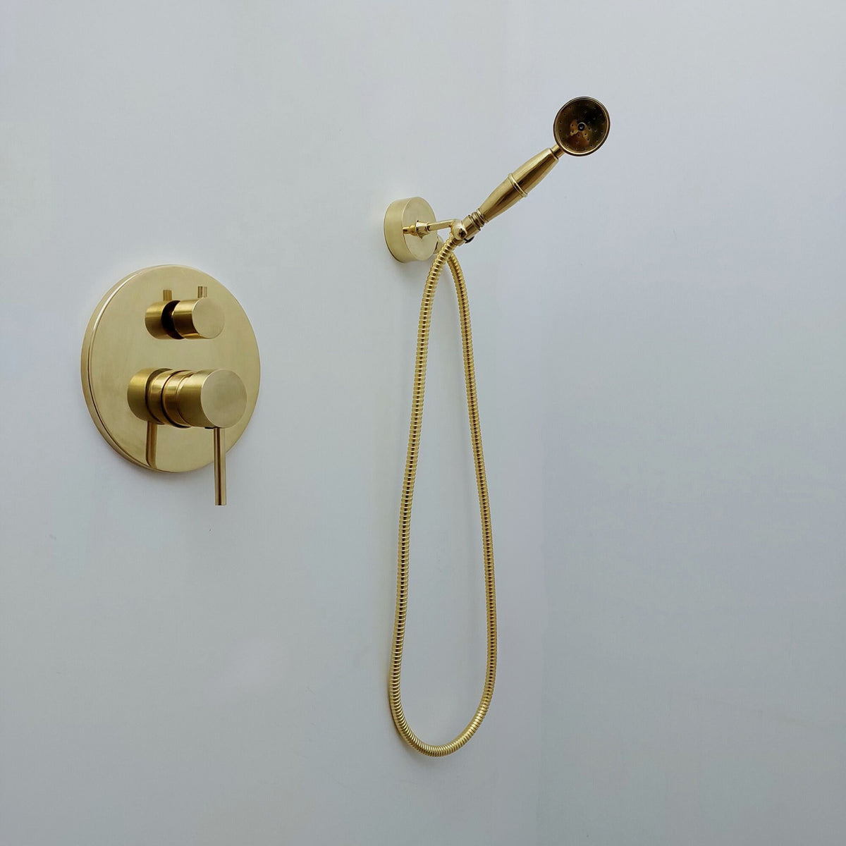 Premium concealed rain shower in living brass with cross handles