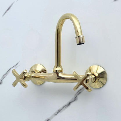 Premium wall mounted brass bathroom faucet installed above a bathroom sink