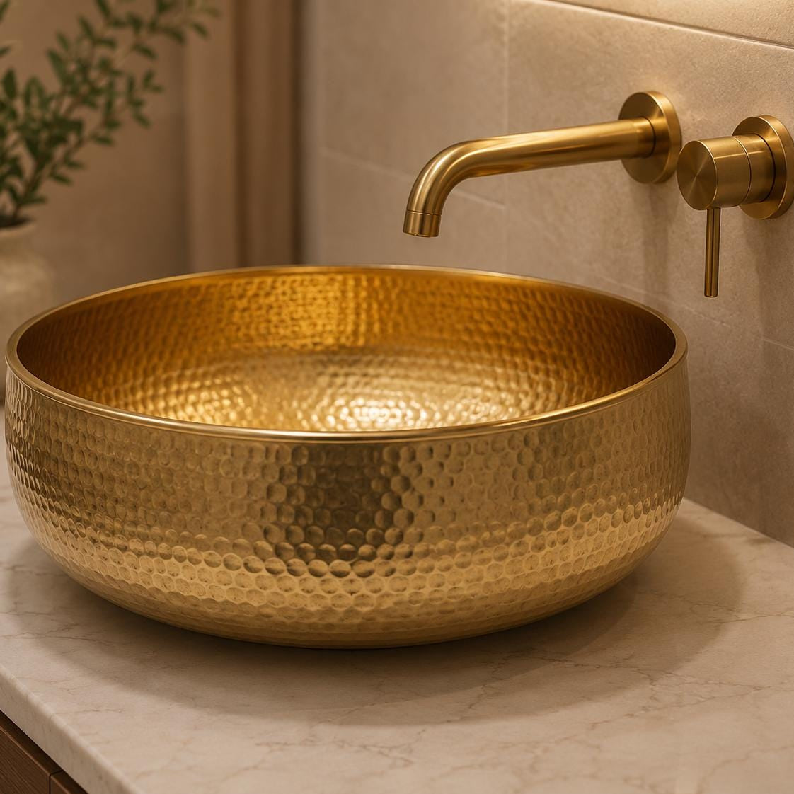 Round solid brass bathroom basin with a hammered finish