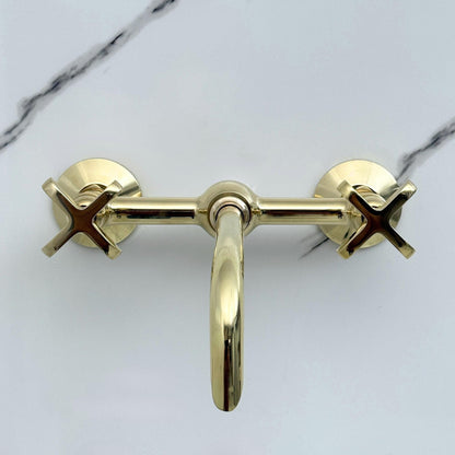 Smooth ball center detail on unlacquered brass faucet