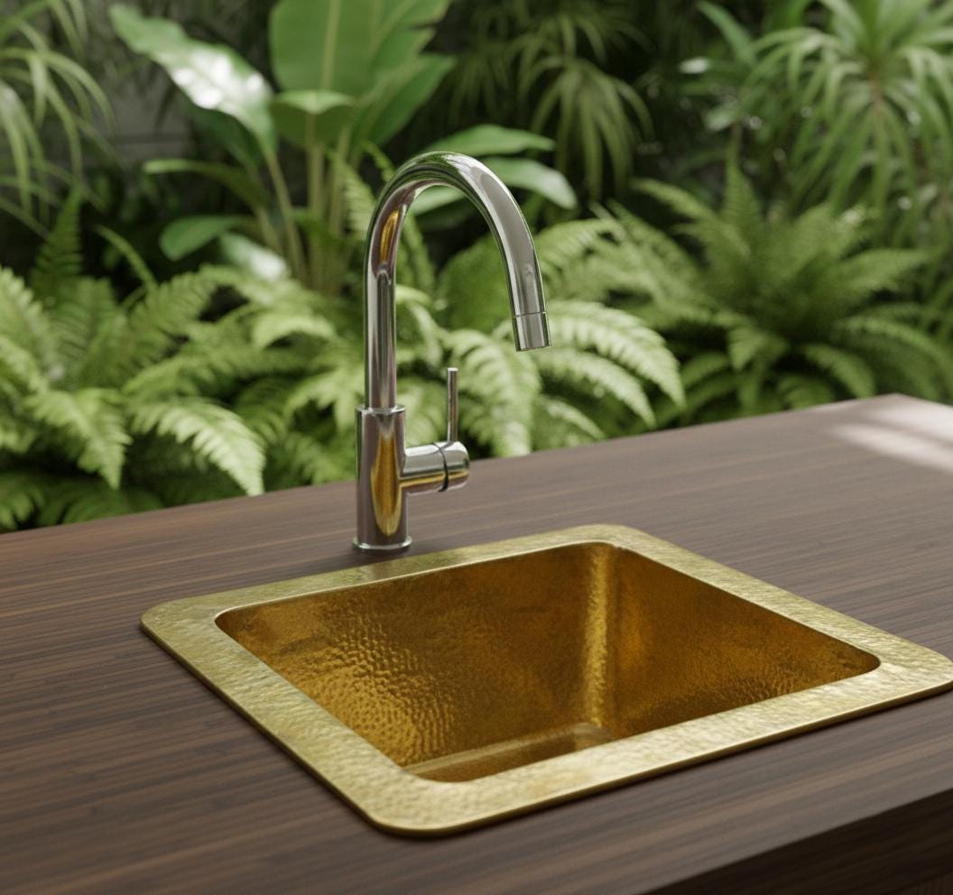 Solid brass single bowl kitchen sink with a hammered finish