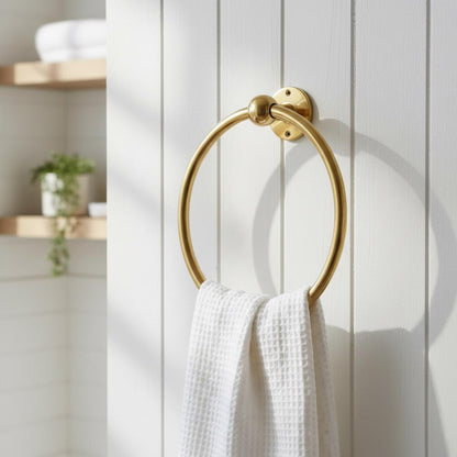 Traditional brass towel ring with concealed wall mounting