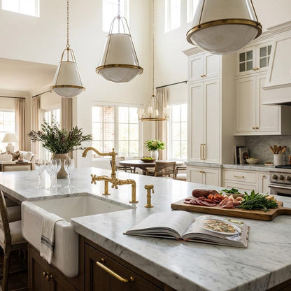 Unlacquered brass bridge faucet for farmhouse kitchens