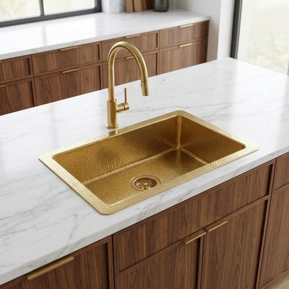 Unlacquered brass farmhouse sink with handcrafted texture
