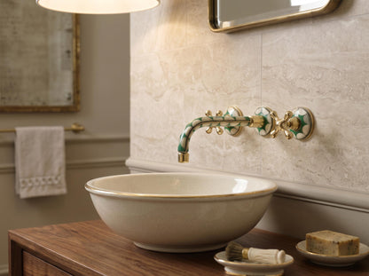 Unlacquered brass patina finish on bone inlay wall faucet