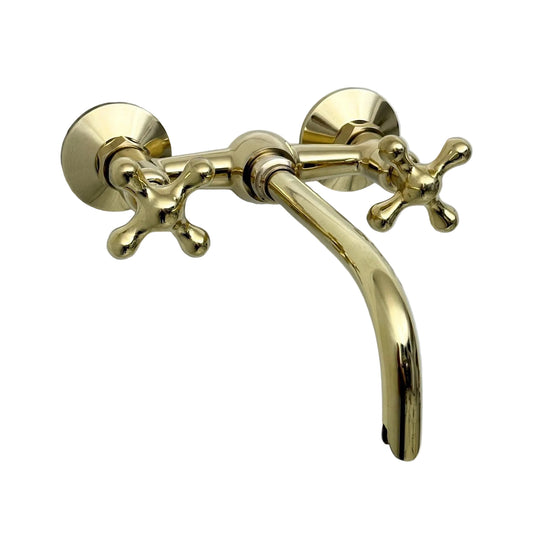 Unlacquered brass wall mount bathroom faucet with cross handles