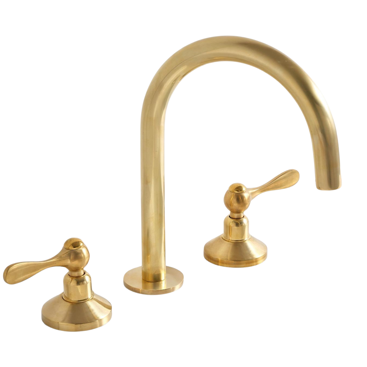 Unlacquered brass widespread bathroom faucet with matching pop-up drain