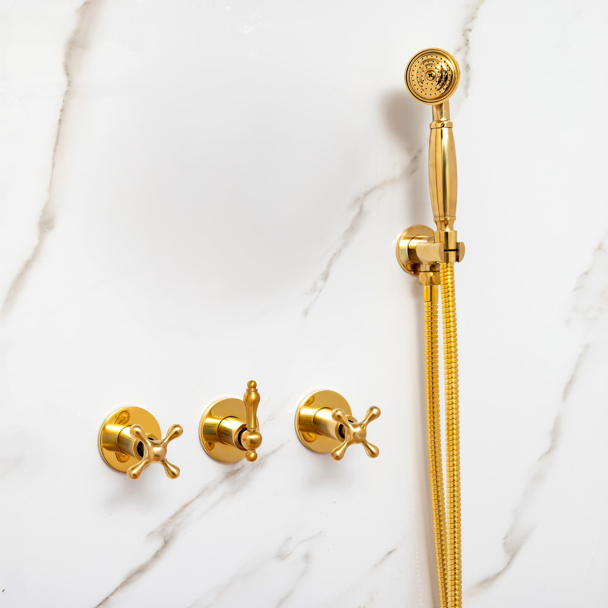 Wall mounted concealed brass shower with a handheld shower