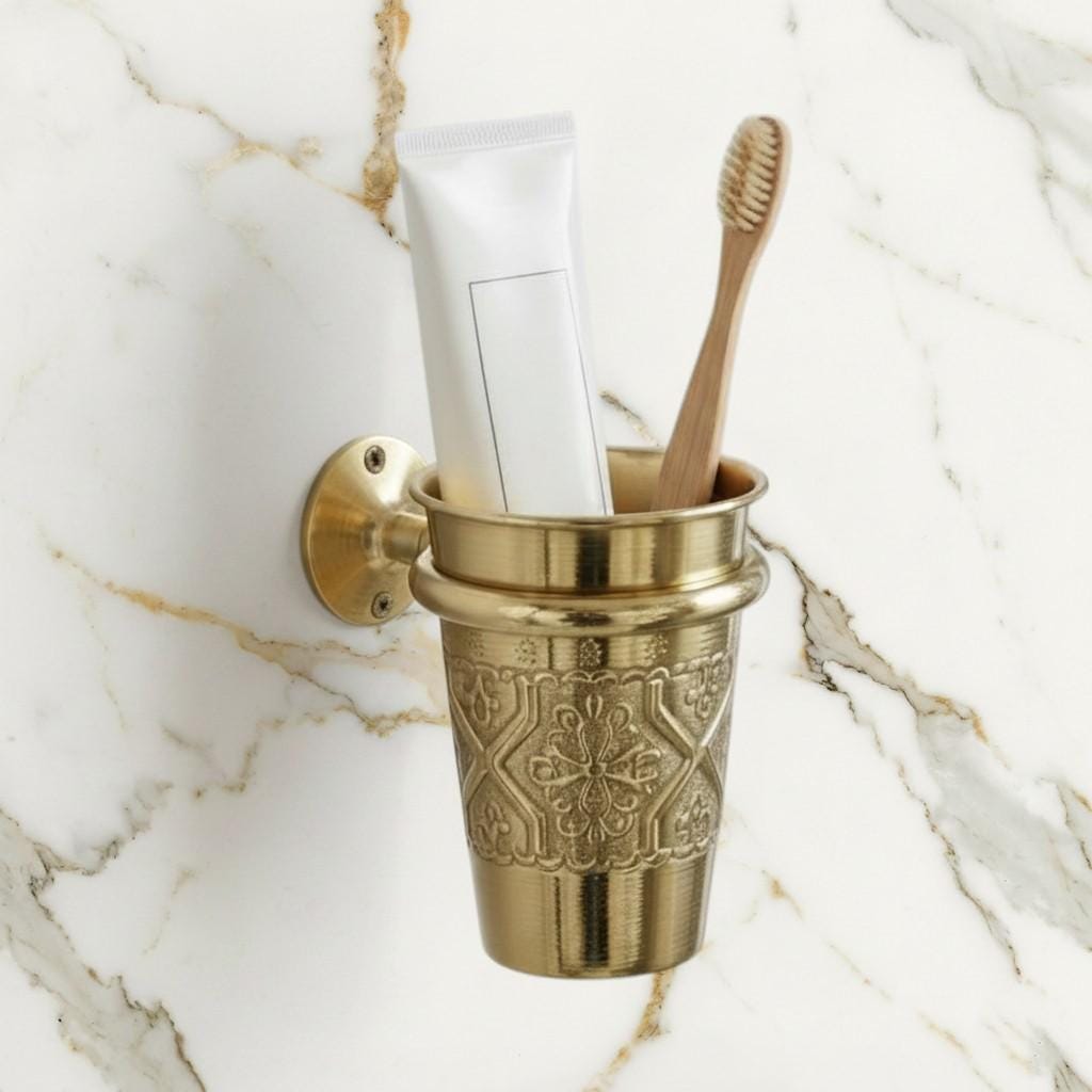 Wall mounted unlacquered brass toothbrush holder with traditional engraving
