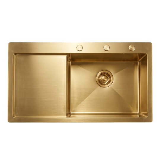 brass kitchen sink with an integrated drainboard in unlacquered brass