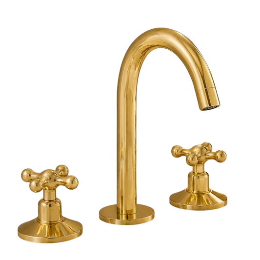 Unlacquered brass deck mounted bathroom faucet with matching pop-up drain