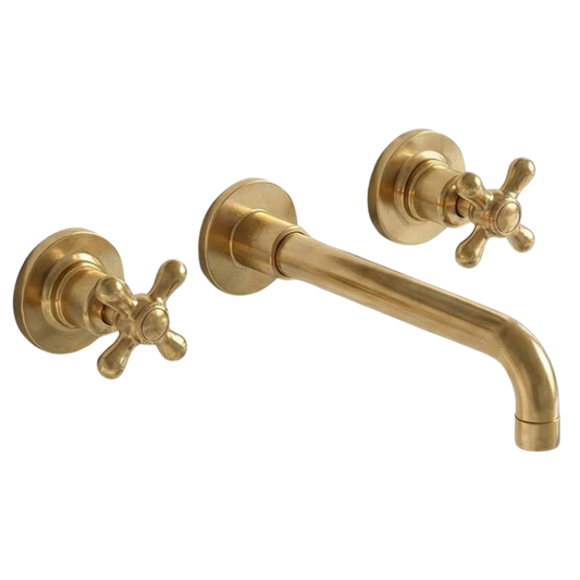 Unlacquered brass wall mounted bathroom vanity faucet with traditional cross handles
