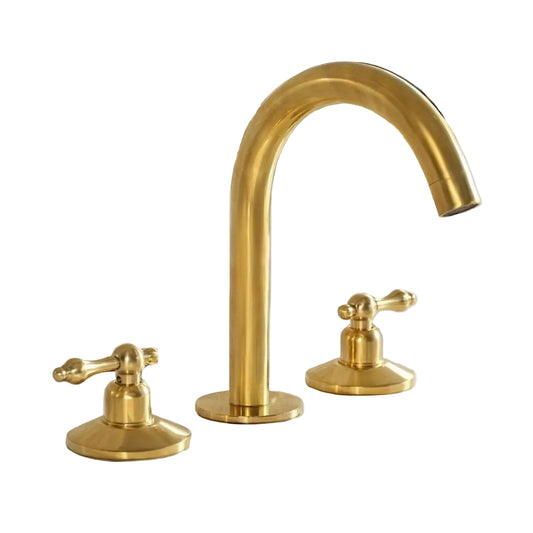 Unlacquered brass widespread bathroom faucet with dual lever handles